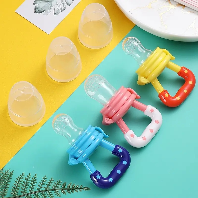 Introducing our innovative baby fruit feeder pacifier! Keep your little one happy and healthy with this safe feeding solution. The image showcases the pacifier filled with fresh fruit chunks, designed to introduce solid foods to infants while minimizing choking hazards. Trust in our quality product to make feeding time a breeze. Shop now for a stress-free feeding experience!