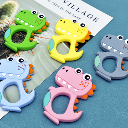 Adorable Silicone Teether: Soothe your baby's sore gums with our cute silicone teether. Made from safe, BPA-free silicone, it's the perfect companion for teething relief. Easy to grasp and featuring playful designs, it's sure to delight your little one. Shop now!