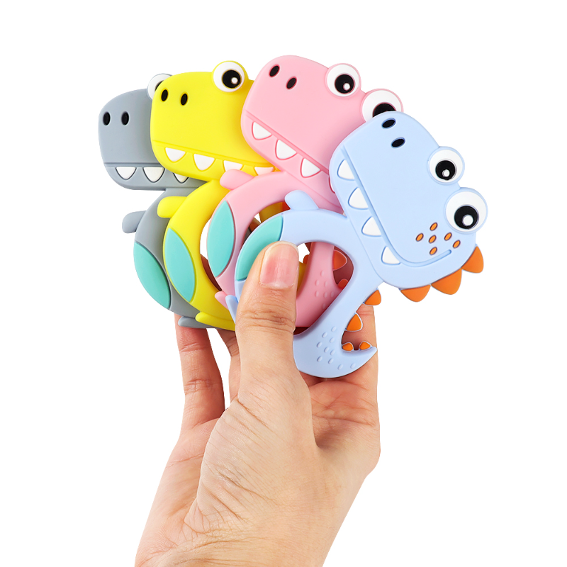 Adorable Silicone Teether: Soothe your baby's sore gums with our cute silicone teether. Made from safe, BPA-free silicone, it's the perfect companion for teething relief. Easy to grasp and featuring playful designs, it's sure to delight your little one. Shop now!