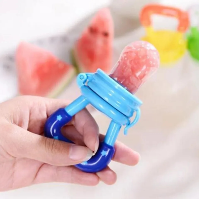 Introducing our innovative baby fruit feeder pacifier! Keep your little one happy and healthy with this safe feeding solution. The image showcases the pacifier filled with fresh fruit chunks, designed to introduce solid foods to infants while minimizing choking hazards. Trust in our quality product to make feeding time a breeze. Shop now for a stress-free feeding experience!