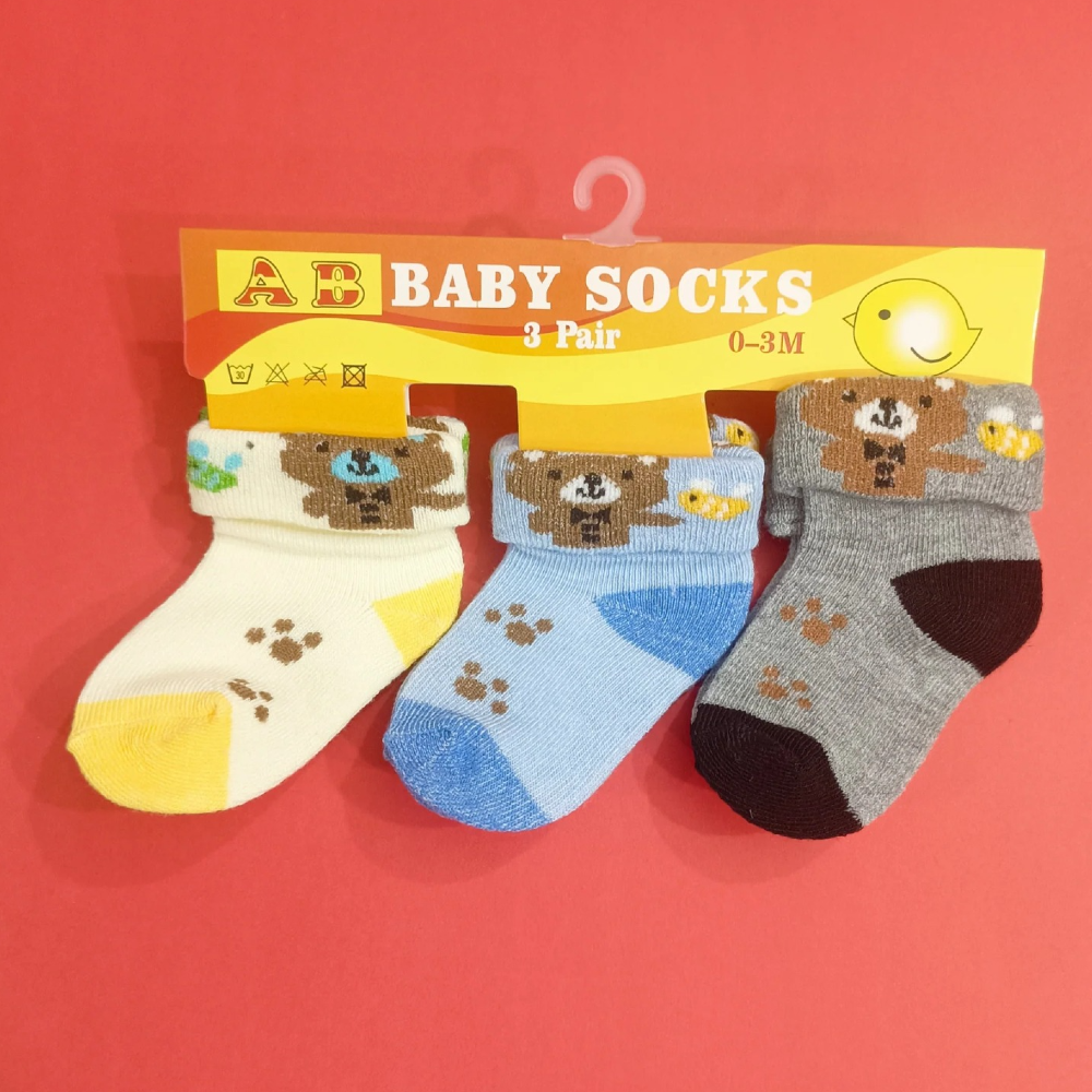 Discover our Cute Printed Design Pack of 3 Newborn Socks, made from soft cotton jersey material. Each pack features random adorable designs and colors, providing comfort and style for your baby's feet. Perfect for newborns, these socks offer a snug fit and delightful variety. Available now at babyfairy.pk.