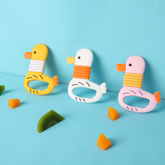 Adorable Silicone Teether: Soothe your baby's sore gums with our cute silicone teether. Made from safe, BPA-free silicone, it's the perfect companion for teething relief. Easy to grasp and featuring playful designs, it's sure to delight your little one. Shop now!