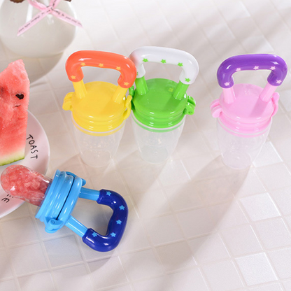 Introducing our innovative baby fruit feeder pacifier! Keep your little one happy and healthy with this safe feeding solution. The image showcases the pacifier filled with fresh fruit chunks, designed to introduce solid foods to infants while minimizing choking hazards. Trust in our quality product to make feeding time a breeze. Shop now for a stress-free feeding experience!