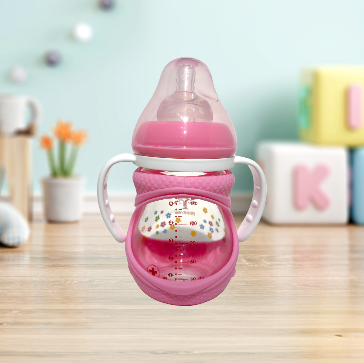 Discover the Minitree Wide Neck Glass Baby Feeder with Handles, perfect for babies 3 months and up. This 160ml feeder, crafted from 0% BPA materials, ensures a safe and healthy feeding experience. Featuring a cute floral print, wide neck for easy cleaning, and ergonomic handles for comfortable grip, it combines practicality, safety, and style. Available now on Babyfairy.pk. Make feeding time delightful and hassle-free!