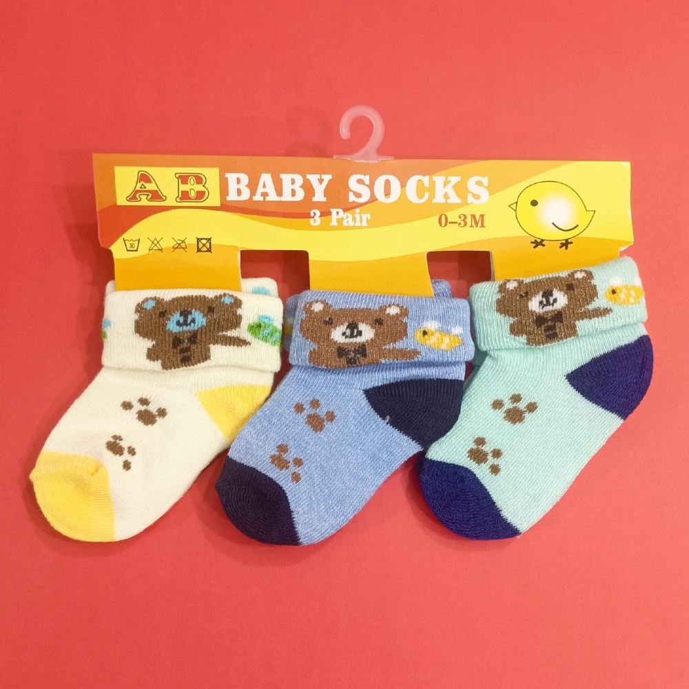 Discover our Cute Printed Design Pack of 3 Newborn Socks, made from soft cotton jersey material. Each pack features random adorable designs and colors, providing comfort and style for your baby's feet. Perfect for newborns, these socks offer a snug fit and delightful variety. Available now at babyfairy.pk.