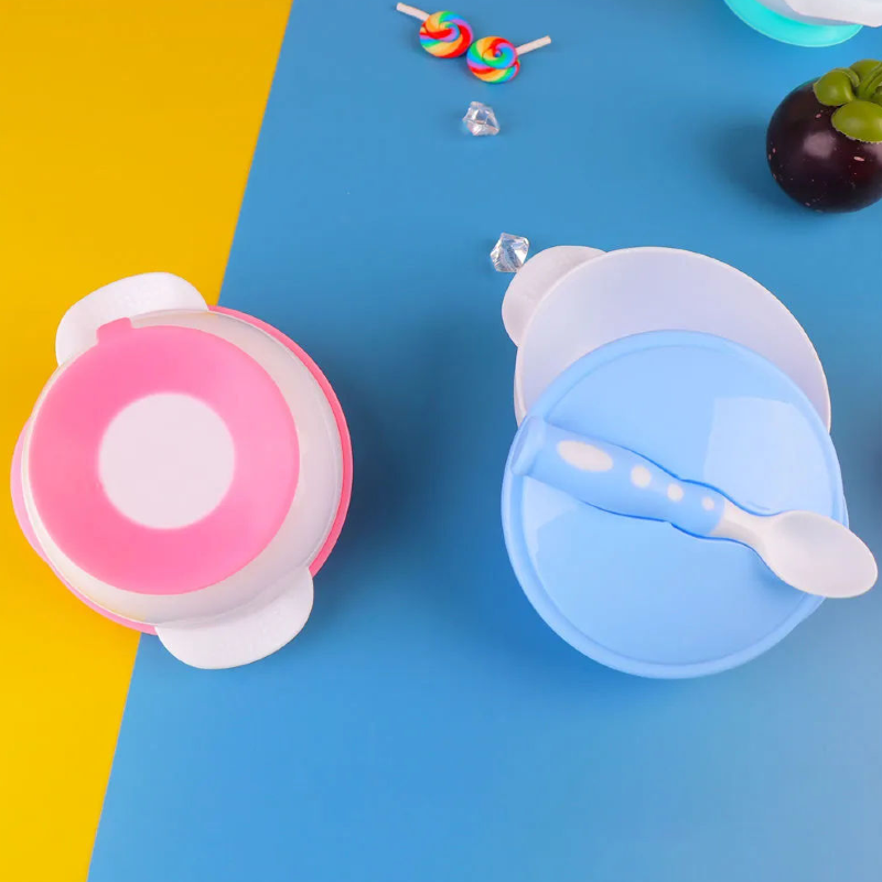 Introducing our Baby Bowl and Spoon Set: Perfect for mealtime adventures! Designed with a convenient suction cap at the bottom of the bowl, ensuring stability during feeding. Crafted from safe, durable plastic, it's easy to clean and gentle on baby's delicate skin. Available in charming baby pink and soothing light blue colors at babyfairy.pk. Elevate mealtime with safety and style!