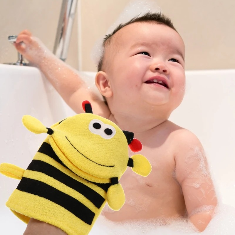 Adorable baby enjoying a gentle bath with our innovative baby bath scrapper - promoting safe and effective cleansing for your little one's delicate skin. Buy now at babyfairy.pk