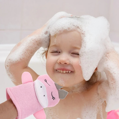 Adorable baby enjoying a gentle bath with our innovative baby bath scrapper - promoting safe and effective cleansing for your little one's delicate skin. Buy now at babyfairy.pk