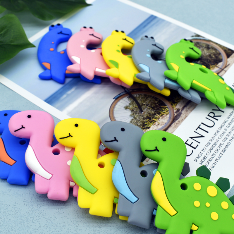 Adorable Silicone Teether: Soothe your baby's sore gums with our cute silicone teether. Made from safe, BPA-free silicone, it's the perfect companion for teething relief. Easy to grasp and featuring playful designs, it's sure to delight your little one. Shop now!