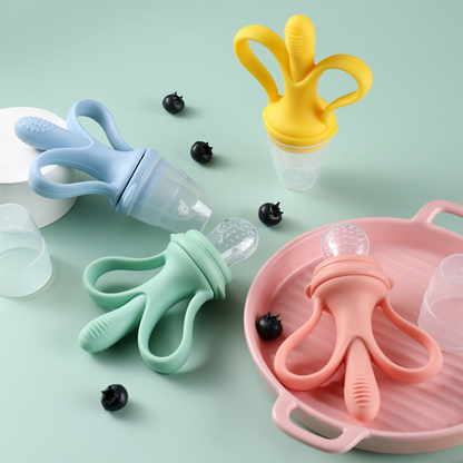 Introducing our innovative baby fruit feeder pacifier! Keep your little one happy and healthy with this safe feeding solution. The image showcases the pacifier filled with fresh fruit chunks, designed to introduce solid foods to infants while minimizing choking hazards. Trust in our quality product to make feeding time a breeze. Shop now for a stress-free feeding experience!