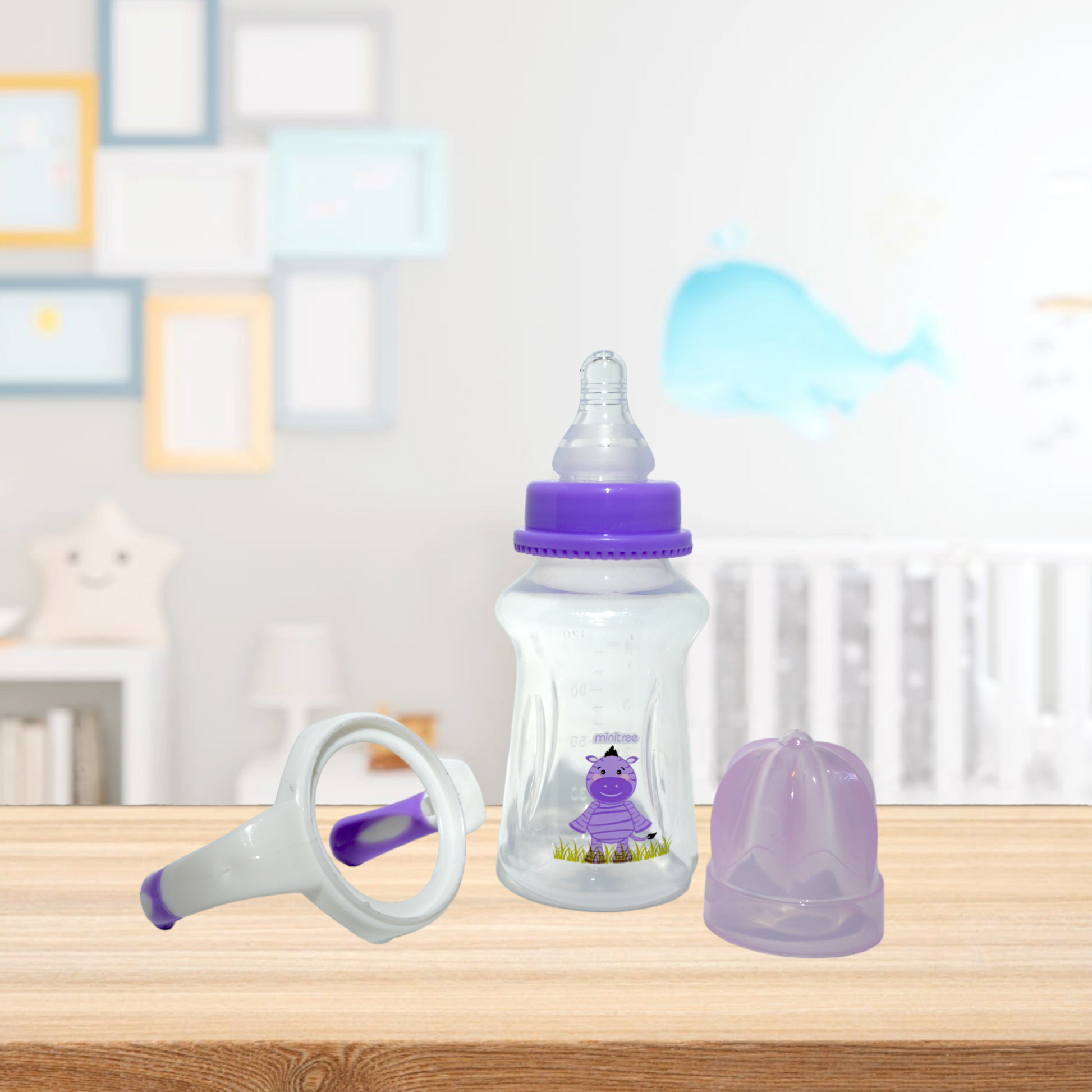 Discover the Minitree Slim Neck Plastic Baby Feeder with Handles, perfect for your baby’s feeding needs. Made from 0% BPA materials, this 150ml / 5 oz feeder ensures a safe and healthy feeding experience. Featuring cute animal prints and available in purple and baby pink, it combines practicality with charm. The slim neck design and ergonomic handles make feeding convenient and fun. Available now on Babyfairy.pk.