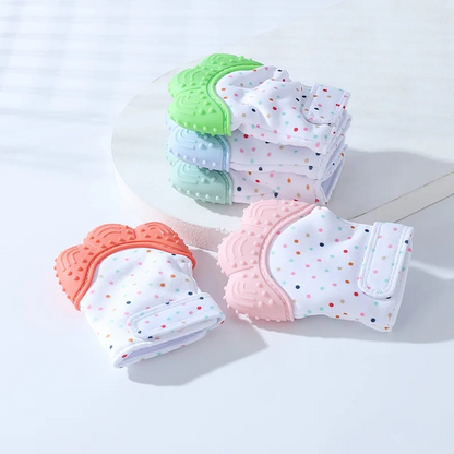 Discover the ultimate solution to teething discomfort with our innovative Glove Teether. Crafted with soft, breathable fabric and featuring a textured silicone surface, this BPA-free teething glove provides soothing relief for your baby's gums while promoting self-soothing and fine motor skills development. Say goodbye to teething woes and hello to happy chewing!